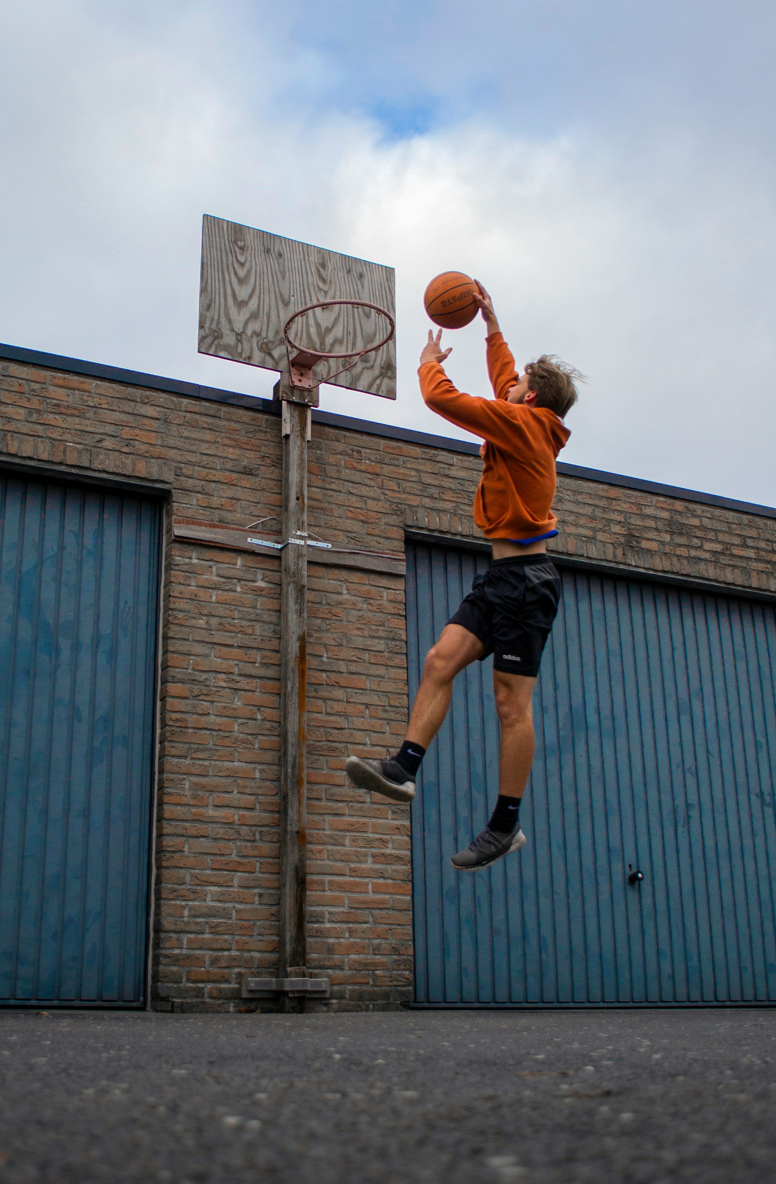 teenager playing basketball